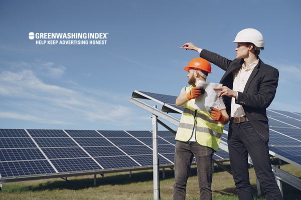 Workers inspecting solar panels for Greenwashing Index initiative