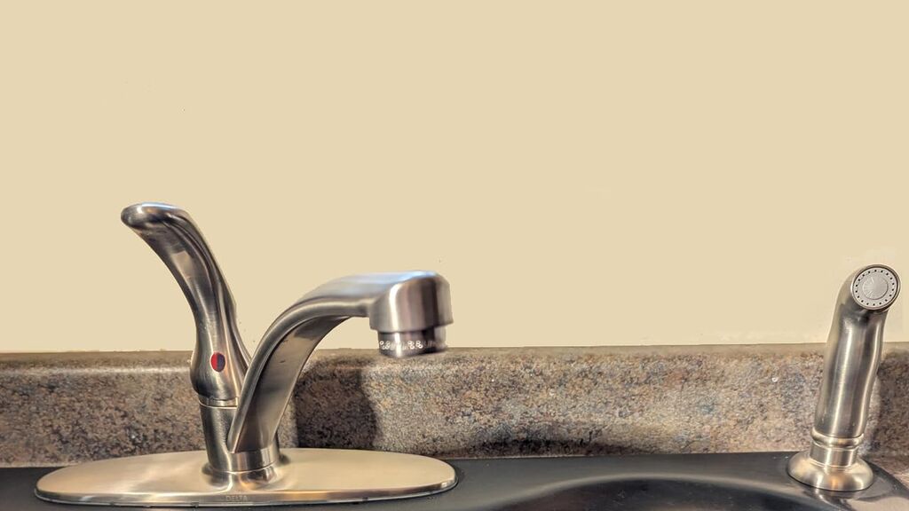 Delta Foundations Chrome Kitchen Faucet with Side Sprayer, Contemporary 4 Hole Kitchen Sink Faucet, Single Handle customer photo 1