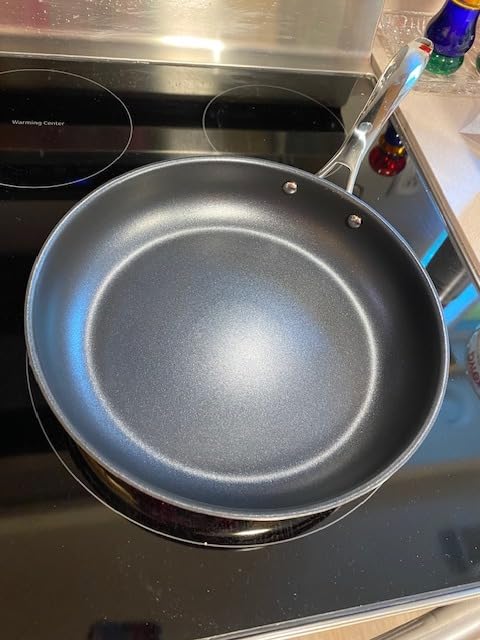 Amazon Basics 2-Piece Non-Stick Stainless Steel Fry Pan Set, Oven Safe, Induction Compatible, Stay-Cool Handles, 10-Inch and 8-Inch customer photo 1