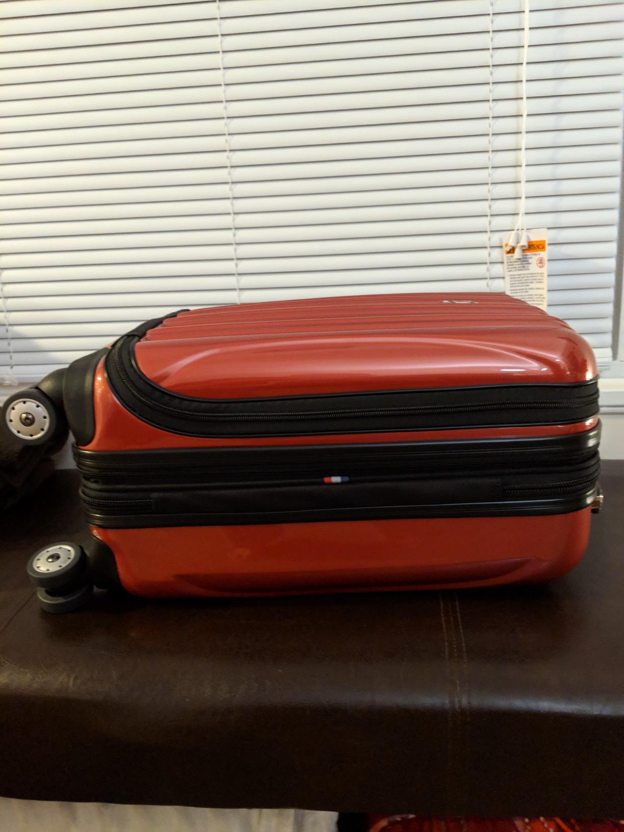DELSEY PARIS Helium Aero Hardside Expandable Luggage with Spinner Wheels, Brick Red, Carry-On Plus 21 Inch customer photo 2