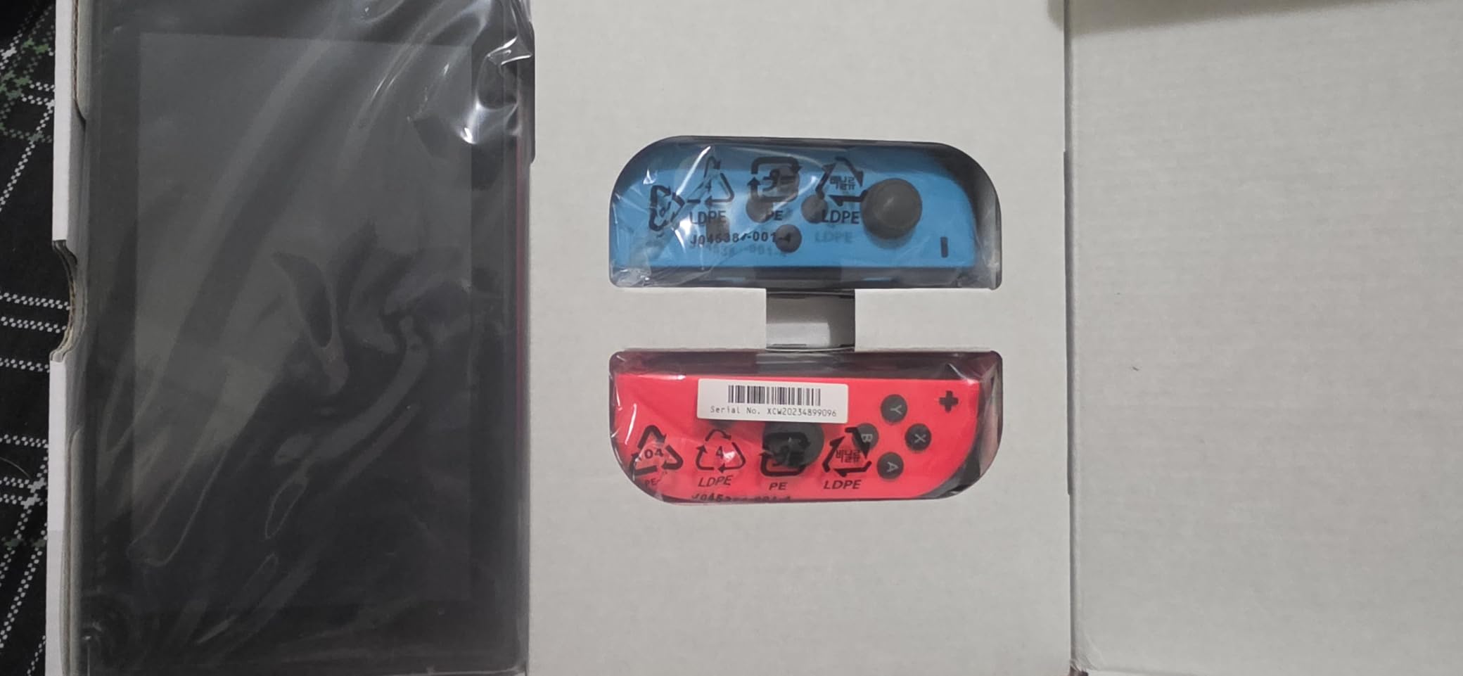 Nintendo Switch with Neon Blue and Neon Red Joy‑Con customer photo 2
